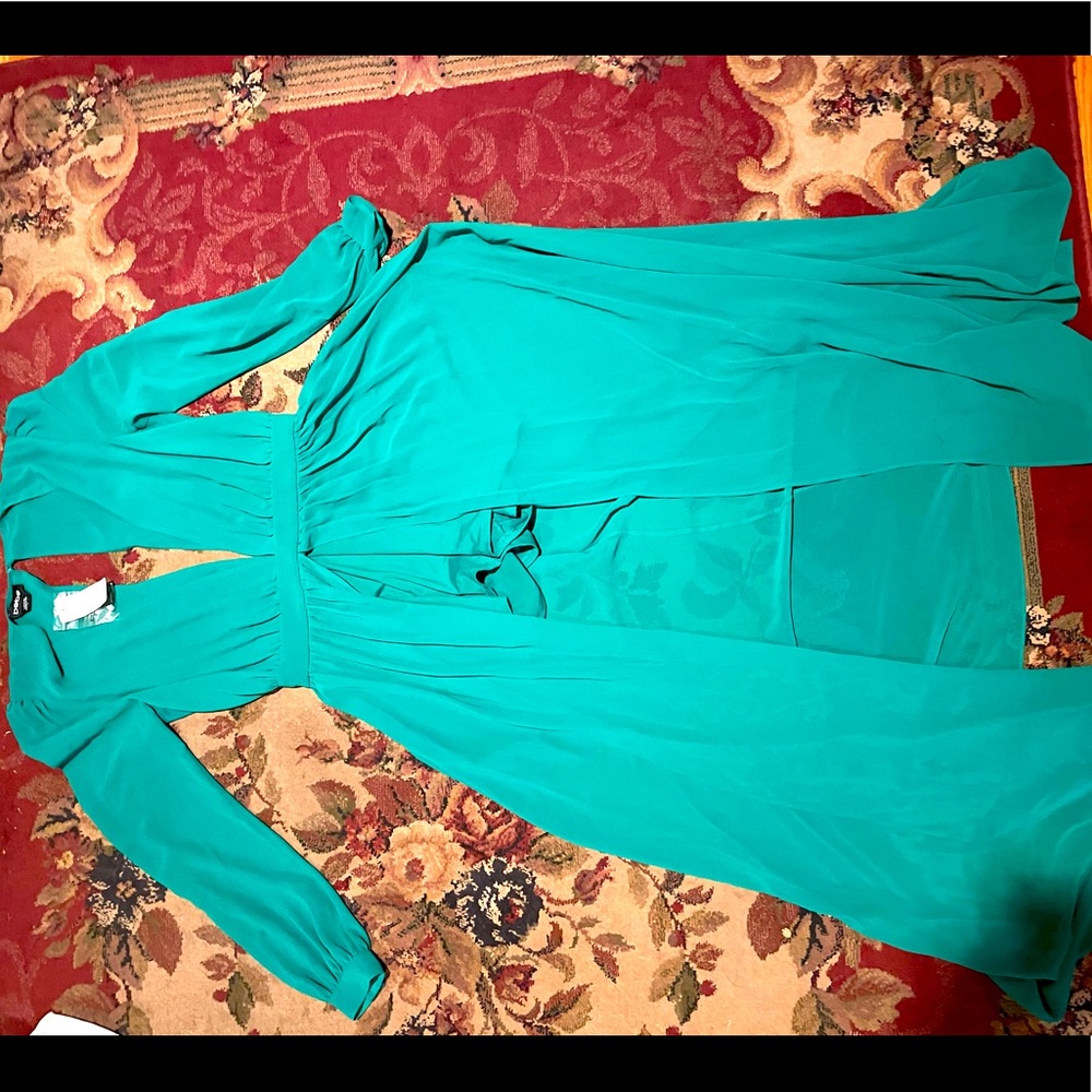 Size 8 Bebe Romper- never worn with tags